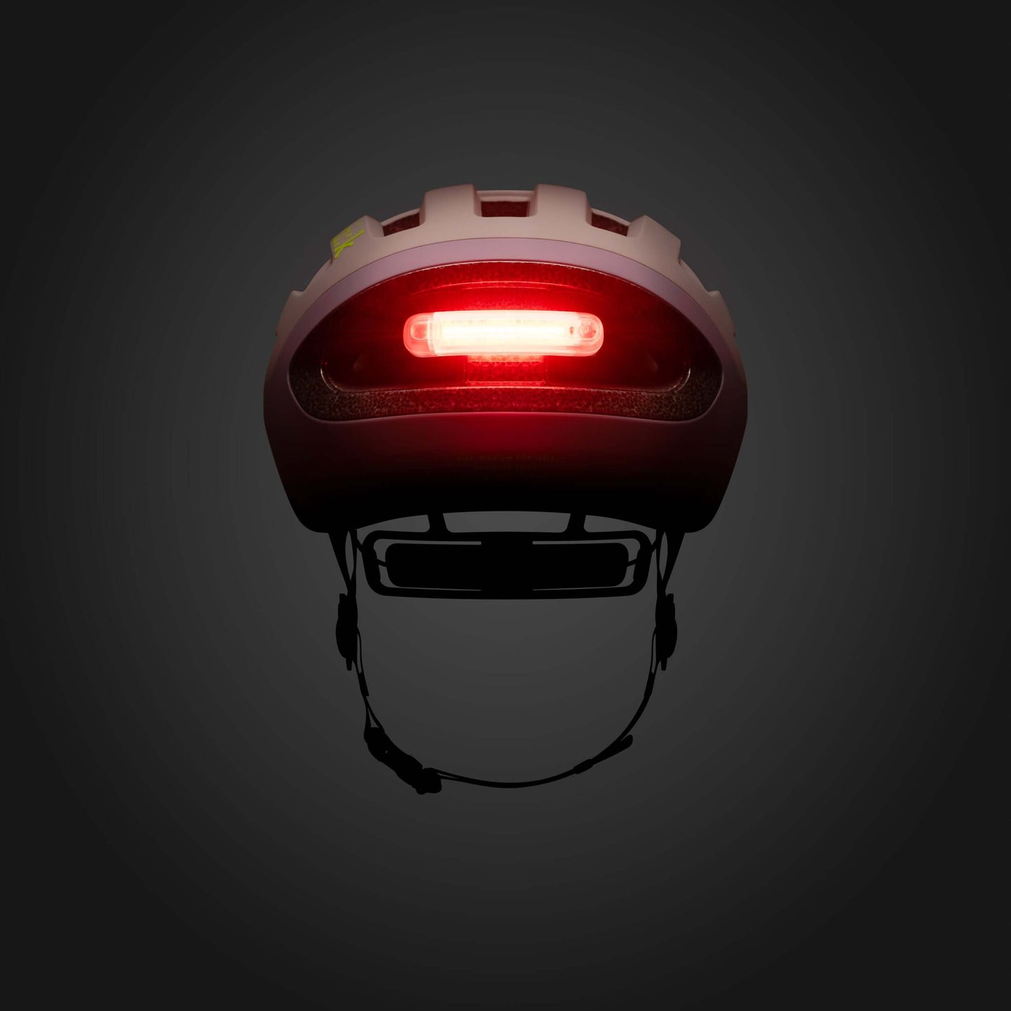 Kask Rowerowy FIZIK Kyros Lavender z tylnym światłem w kolorze czerwonym na ciemnym tle.